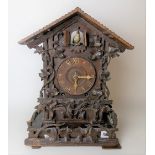 Blackforest carved two-train cuckoo mantel clock with 4in dial with carved bone hands & Roman