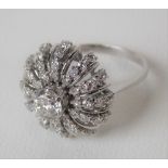 18ct white gold diamond cluster 'starburst' ring, the central diamond of 0.50ct spread approx. &