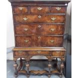 An early 18th Century walnut veneered chest on stand