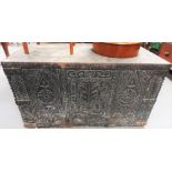 Antique stained pine carved iron bound coffer, the whole carved in 17th Century style with foliate &