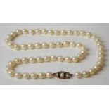 Pearl necklace with 9ct hallmarked gold clasp set with three pearls, length 48cm