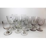 Twelve various late 18th/early 19th Century stemmed wine glasses, height of largest 15cm