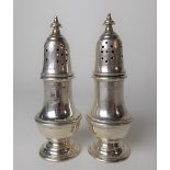 Pair of 925 silver pedestal pepperettes, maker MTS, weight 4.65oz approx.