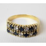 14ct gold diamond and sapphire set fourteen stone ring, the stones of 0.05ct spread approx,