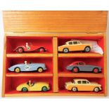 Six various Dinky Toys diecast cars, including an MG Midget no. 109, Triumph TR2 and a Sunbeam