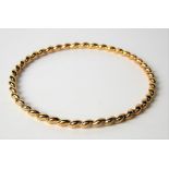 9ct hallmarked gold twist bangle, weight 18g approx.