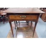 18th Century oak lowboy with single frieze drawer & on cylindrical tapering legs & on pad feet,