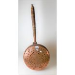 19th Century copper bed pan, the pierced lid wriggle work engraved with a cavalry officer with