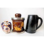 A Royal Doulton mug in leather blackjack moulded design; together with a Royal Doulton silver