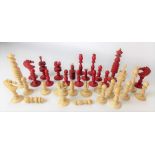 Red stained and natural ivory turned chess set (damages).