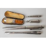 Silver mounted cheroot holder with amber mouthpiece & within fitted leather case; together with