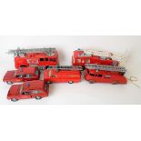 Four various Dinky Toys diecast fire engines, including an A.R.F. fire tender, a Merryweather