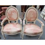 Pair of 19th Century French style white painted carved upholstered armchairs