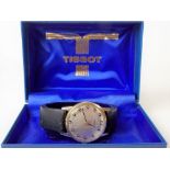 Tissot gents yellow metal cased manual wind wristwatch, the silvered brushed 28mm dial with Arabic