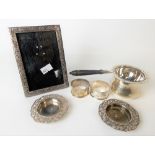 Collection of continental white metal silver items, including a tea strainer stamped 'Sterling