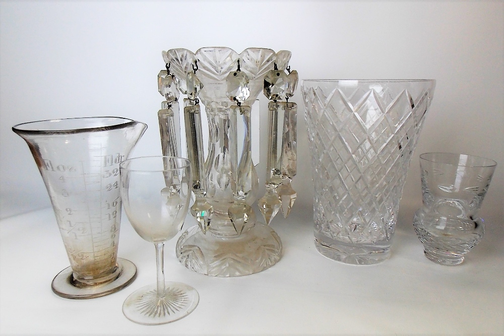 Five pieces of antique glass, including a clear glass lustre, cut vase, wheel engraved measuring