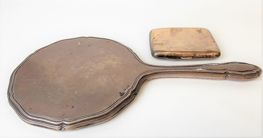 George V silver engine turned cigarette case, Birmingham 1917; together with a dressing table hand