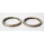 Two 9ct white gold diamond chip set eternity rings, weight 3.5g approx.