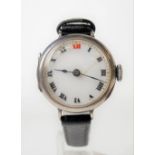 Early 20th Century silver lug wristwatch with 20mm white enamel dial with Roman Numerals & with