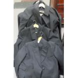 British Rail clothing, including two raincoats, a woollen overcoat and a three piece woollen suit.