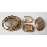 Four 19th Century gold mounted morning brooches with glazed hair panels, weight overall 31.5g
