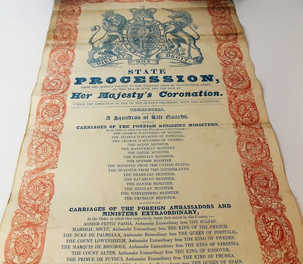 A rare Queen Victoria Coronation State procession scroll, printed in blue and red on paper by J.