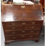 Good George III oak bureau, the fall front with two 'Edwin Cotterill's Patent Climax Detector' locks