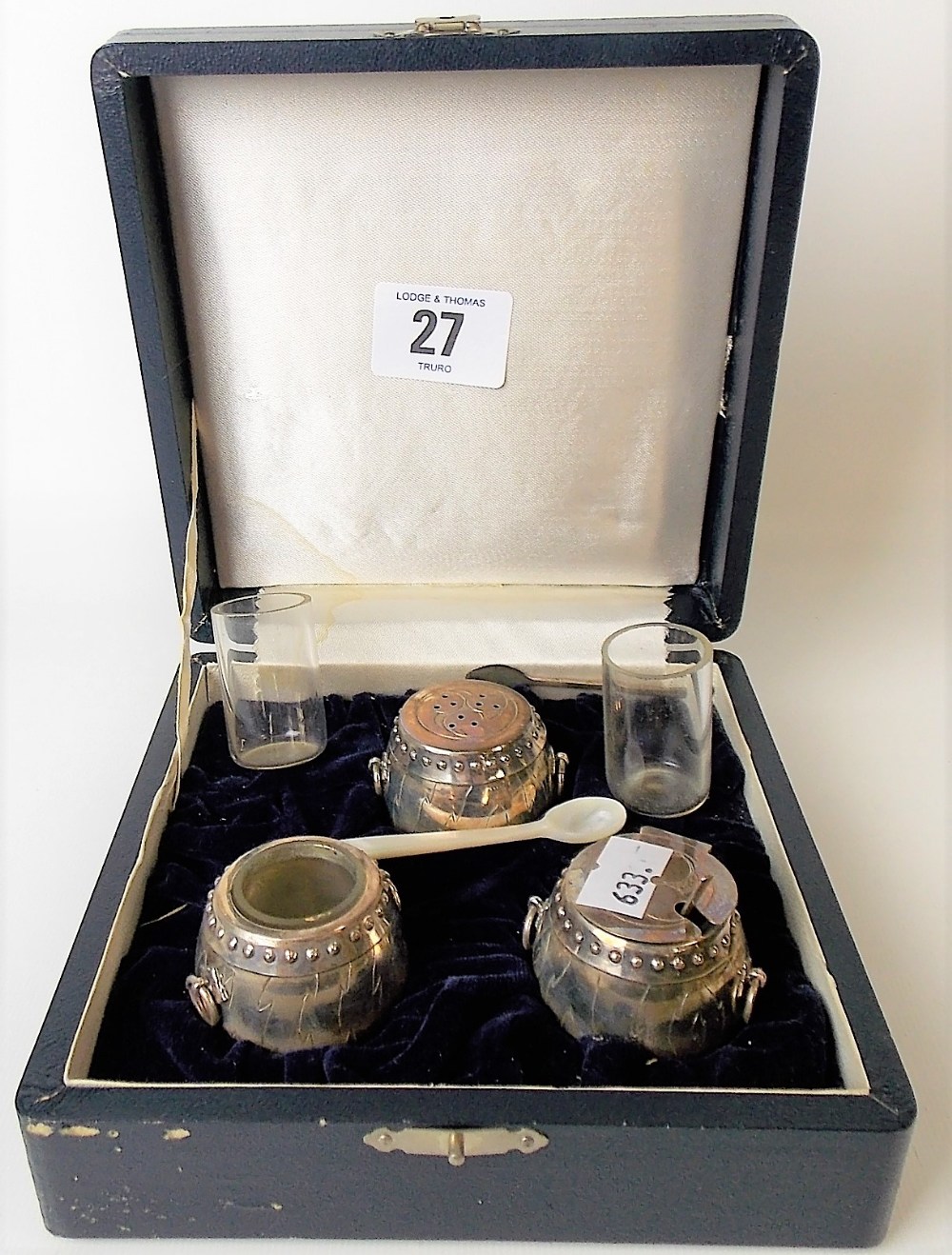 Japanese sterling silver three piece cased cruet in the form of ring handled garden seats,