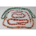 Glass graduated bead necklace together with four hard stone bead necklaces