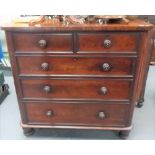 Victorian mahogany veneered chest of two short over three long graduated drawers upon turned feet,