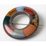 Scottish silver multi-hardstone annular brooch, diameter 48mm.