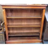 Early 20th Century mahogany low bookcase with four adjustable shelves & on a plinth base, width
