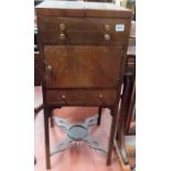 Early 19th Century mahogany boxwood strung wash stand, the two hinged top with apertures for a