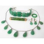 9ct gold mounted green Jadeite rectangular bar brooch; together with a Jadeite bracelet, drop