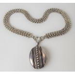 Victorian silver pendant locket on choker chain, weight 45g approx.