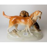 Royal Dux porcelain group modelled as two dogs, the base with printed and pink pad mark, width