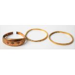 Two thin 22ct gold band rings; together with a broken 9ct gold ring, total weight 1.8g approx (3).