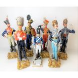 Set of six Capodimonte porcelain 19th Century solider figures, height of largest 31cm; together with