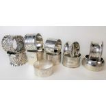 Eleven various hallmarked silver napkin rings, weight overall 7.85oz approx.