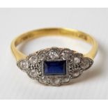 Early 20th Century 18ct gold & platinum set diamond & sapphire cluster ring, the baguette cut