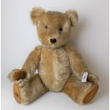 Pre-War blonde mohair teddy bear with jointed limbs, possibly a Chiltern Hugmee, height 50cm
