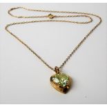 9ct gold pale green stone set heart-shaped pendant necklace, weight 3.2g approx.