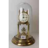 Brass torsion timepiece under glass dome, height overall 31cm