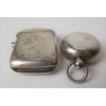 Edwardian silver fob sovereign case, Birmingham 1906; together with a silver Vesta case,