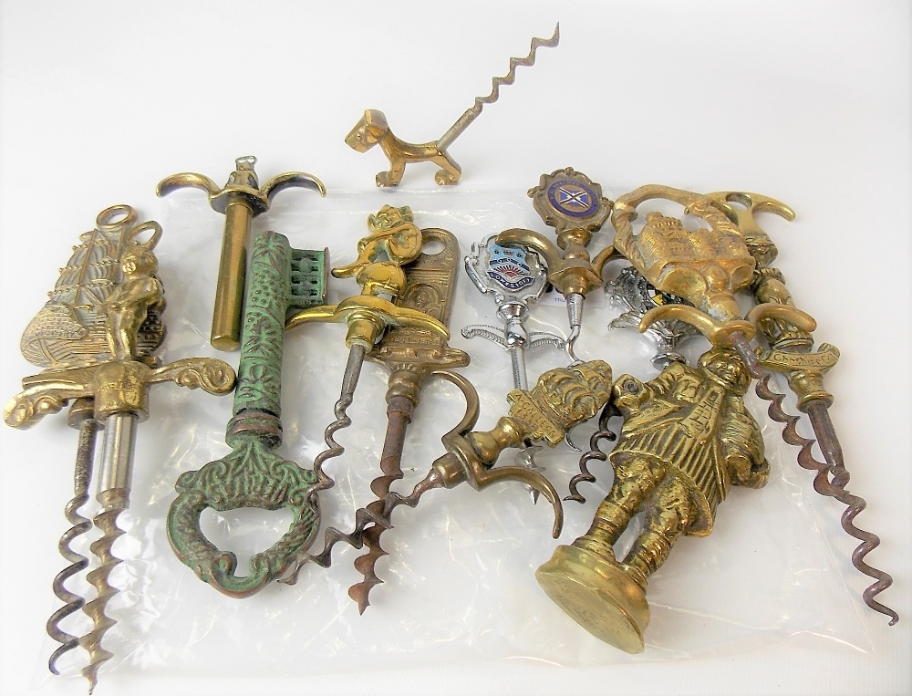 Large collection of novelty corkscrews.