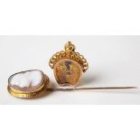 9ct hallmarked gold compass fob, weight 5.7g approx; together with a 9ct gold shell cameo stick pin,