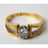 Modern 18ct gold illusion set diamond solitaire ring, the diamond of 0.15ct spread approx, weight