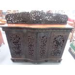 Good 19th Century Anglo Indian foliate carved & pierced bow front sideboard, the raised carved &