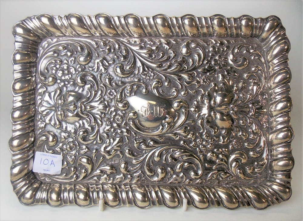 Victorian silver foliate scroll embossed rectangular tray decorated with two green man masks &