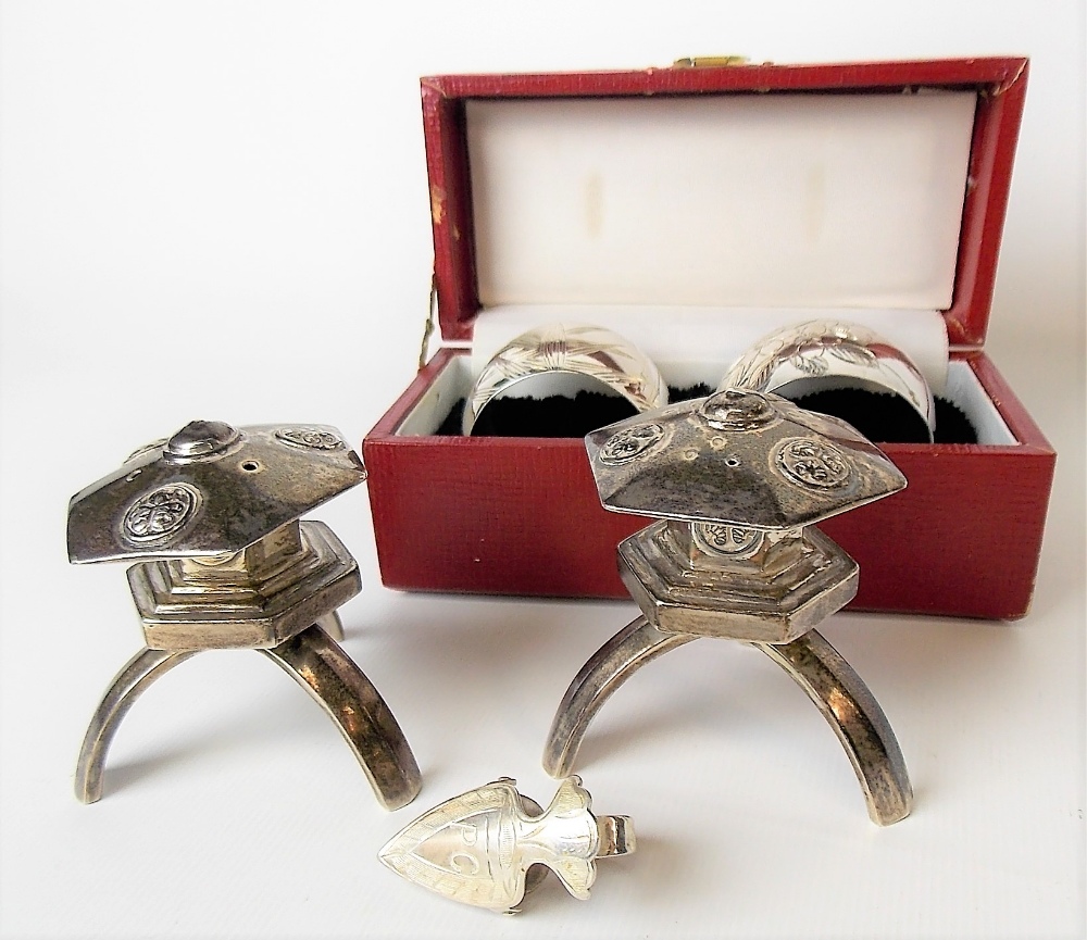 Pair of Japanese sterling silver pepperettes in the form of garden lanterns, both stamped 'MADE IN